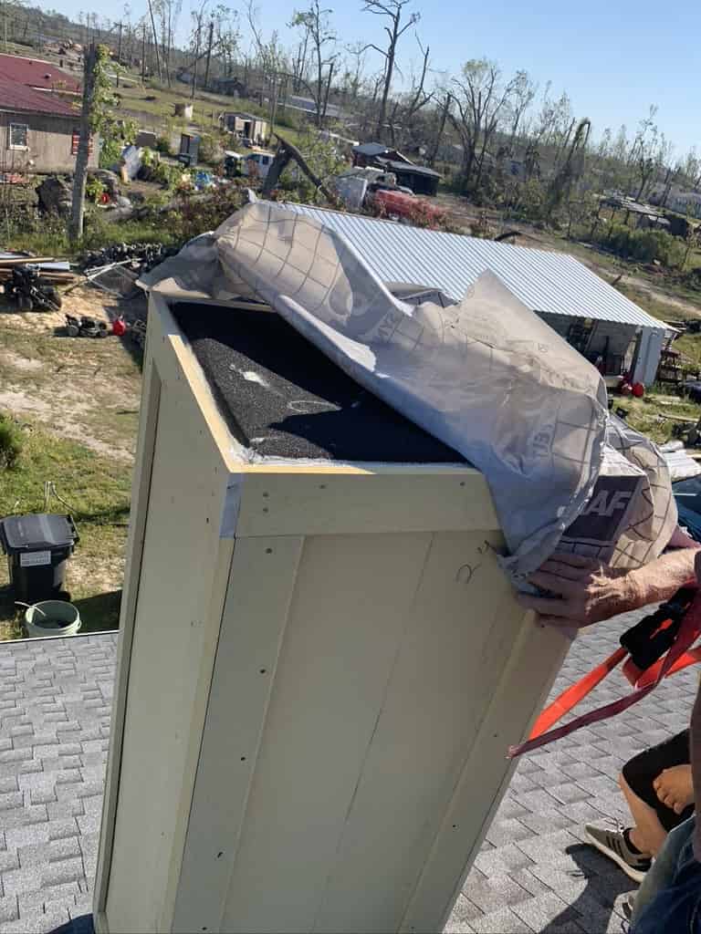 Advanced Fireplace Technician repairing weather damaged chase cover in Biloxie